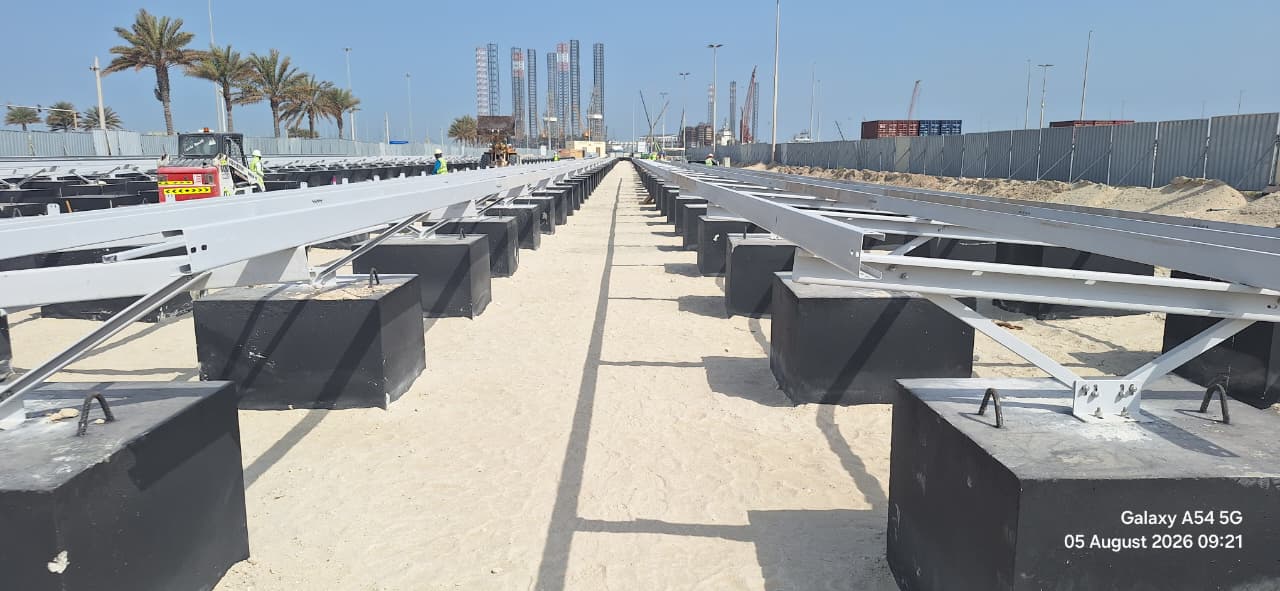 Solar ballast mounting structure viewed along installation row at Middle East site